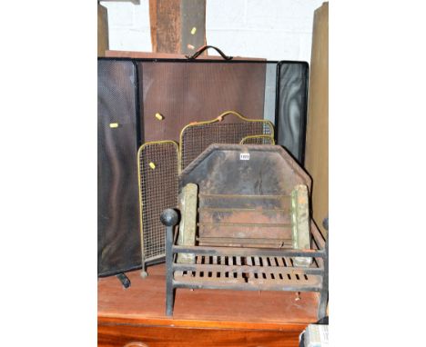 A CAST IRON FIRE GRATE, a cast iron fire back and two fire guards and a foot scraper (5)