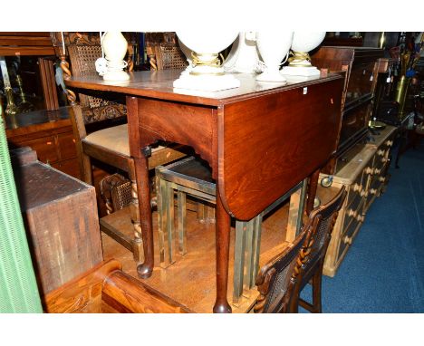 A GEORGIAN MAHOGANY GATE LEG TABLE, on padded feet, together with six early 20th Century oak barley twist chairs (7)
