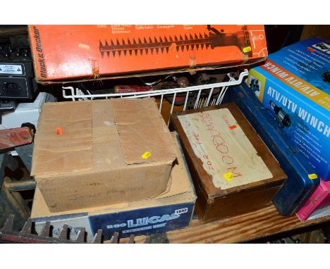 A TRAY OF TOOLS, a mitre jig, an exchange unit, a hedgetrimmer attachment, a wooden box and a socket set
