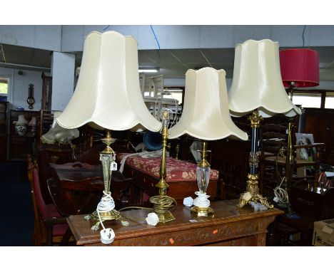 A 20TH CENTURY BRASSED TABLE LAMP with shade, another brass lamp with a glass shade and two other table lamps (4)