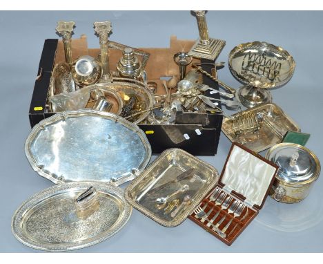 TWO BOXES OF SILVER PLATE INCLUDING TWO PAIRS OF CANDLESTICKS, cake baskets, entree dishes, cocktail shaker, ice bucket, flat