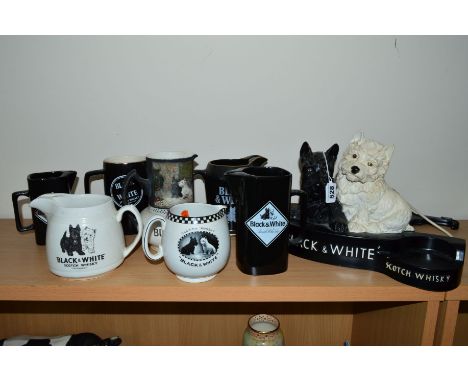 'BLACK AND WHITE SCOTCH WHISKY' ADVERTISING ITEMS, to include plastic stand and various jugs
