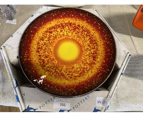 A boxed limited edition Poole pottery sun plate 496/1000 signed d26.5cm 