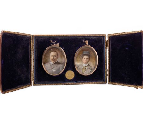 PAIR OF EDWARDIAN PORTRAIT MINIATURES CIRCA 1904 depicting a gentleman and woman, watercolour on ivory, in gold plated surrou