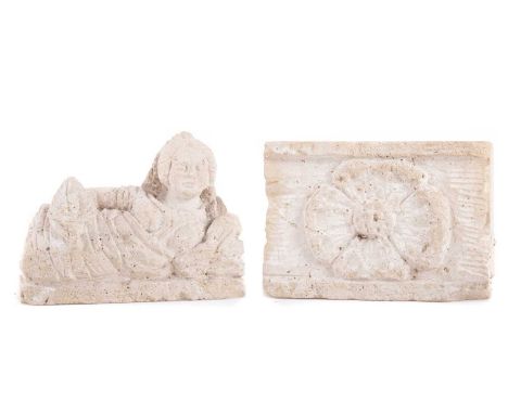 TWO LIMESTONE ARCHITECTURAL CARVINGS the first featuring a Yorkshire rose, the second a recumbent woman, possibly from York M