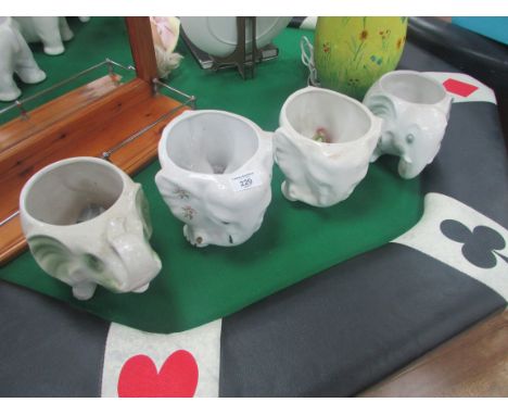 4 ceramic elephant planters
