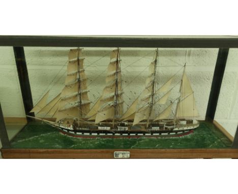 Glazed cased scale model of triple masted ship Archibald Russell, built 1905 with ivory plaque depicting ships details (70.5c