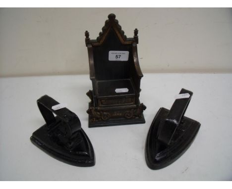 Two vintage flat irons and a Coronation cast metal 1953 throne 