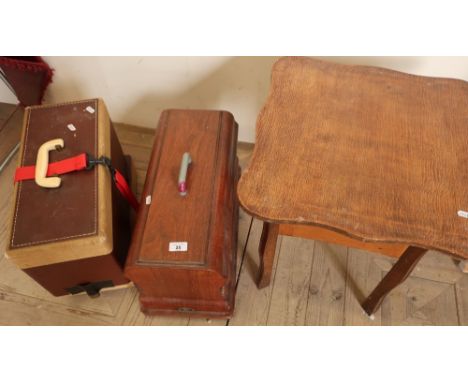 Wooden cased vintage sewing machine, another later sewing machine and an oak sewing table (3) 