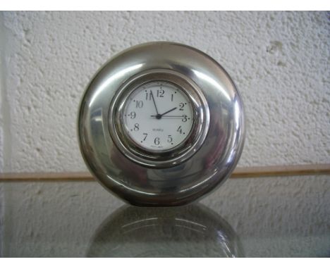 Unusual desk clock in silver plated case, with quartz movement (height 8cm) 
