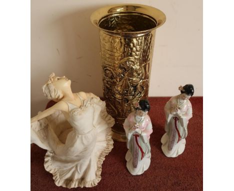 Pressed brass stick stand and three decorative figures 