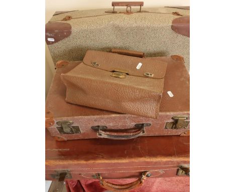 Selection of various leather and other vintage suitcases and luggage 