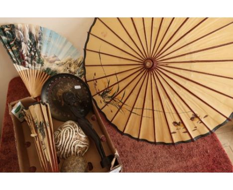 Two Eastern style paper parasols, two Studio ceramic  figures, an Indian plate and a carved African figure 
