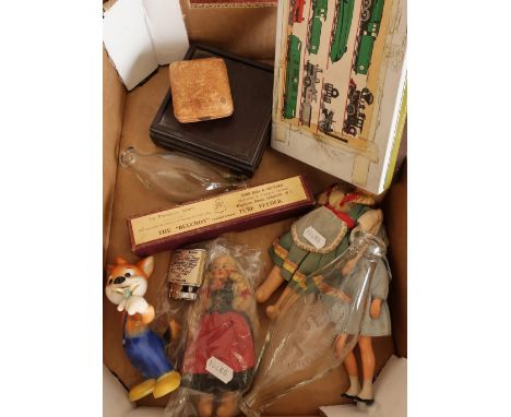 Goebel (Hummel) Kau figure, selection of various dolls, train jigsaw, vintage glass feeding bottles, Roland lighter etc 