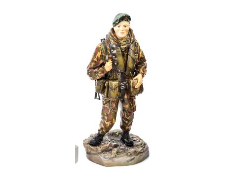 An Ashmor Falklands commemorative painted porcelain figure of a R Marine, 40,42 and 45 Commando, in full kit with Sten gun,  