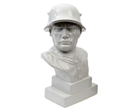 A c 1930s period white porcelain bust of a German soldier, wearing WWI pattern steel helmet, height 12”. GC Plate 1          