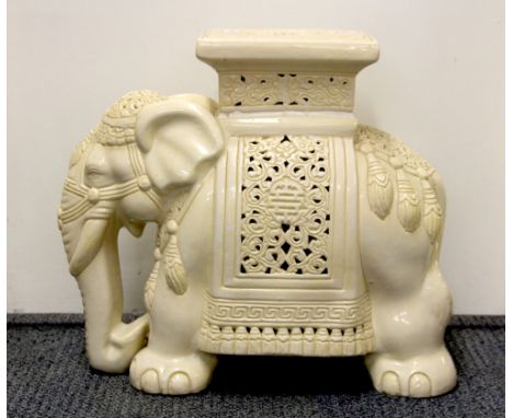 A glazed ceramic elephant stool, H. 45cm.