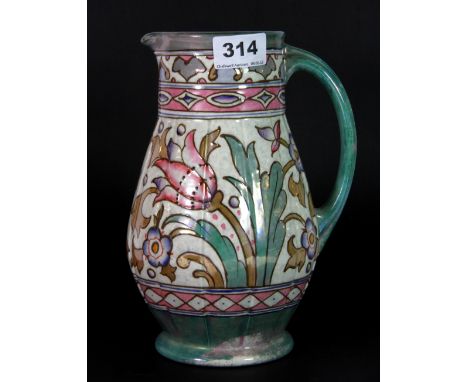 A Charlotte Rhead Bursley ware jug, H. 23cm.