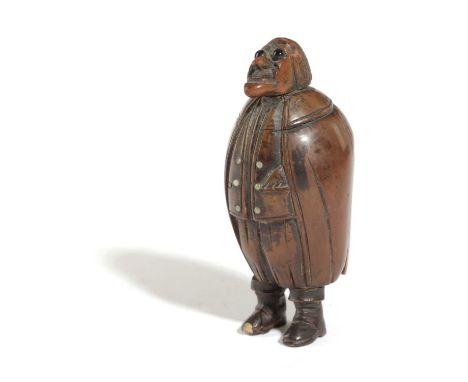 A COQUILLA NUT FIGURAL SNUFF BOX OF A PORTLY GENTLEMANPROBABLY FRENCH, LATE 18TH / EARLY 19TH CENTURYwith glass eyes and butt