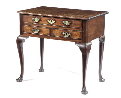 A GEORGE II IRISH MAHOGANY LOWBOYC.1750-60the top with a caddy moulded edge, above three drawers on cabriole legs and pad fee