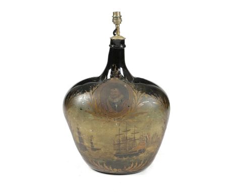 A LARGE DUTCH GREEN GLASS ONION BOTTLEC.1700painted with an oval portrait of Admiral Piet Pieterszoon Hein above a Dutch-Span