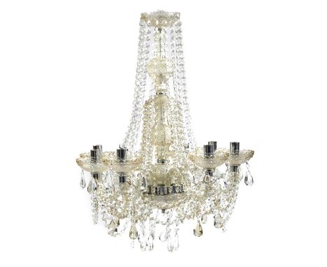 A PAIR OF GLASS EIGHT LIGHT CHANDELIERS20TH CENTURYeach with a baluster column issuing scrolling brackets hung with swags, to