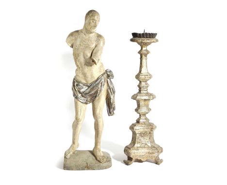 A GERMAN POLYCHROME FIGURE OF CHRIST18TH CENTURYstanding, wearing a silvered knotted cloth around his waist, together with a 
