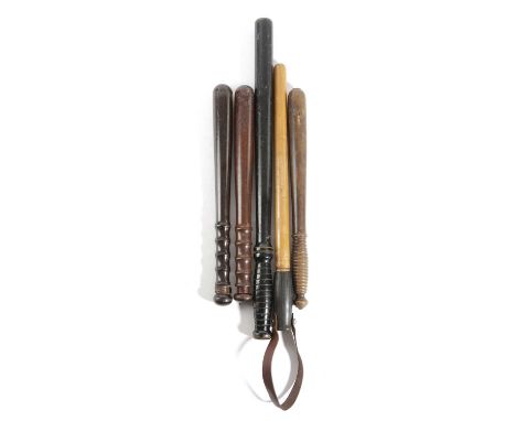 A COLLECTION OF FOUR POLICE TRUNCHEONSMID-19TH CENTURY AND LATEReach with turned handles, one ebonised, and a 20th century ba