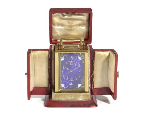 A FRENCH GILT BRASS AND ENAMEL MINIATURE CARRIAGE CLOCK19TH CENTURYthe brass eight day movement with a platform lever escapem