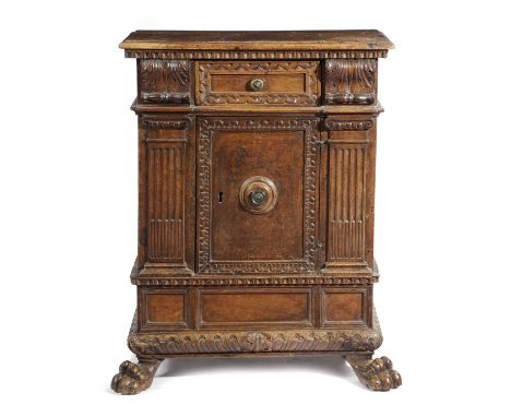 AN ITALIAN WALNUT SIDE CABINETTUSCAN, 17TH CENTURYwith a pair of architectural pilasters flanking a frieze drawer on front ca