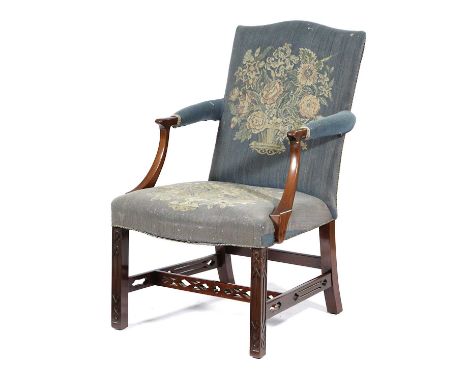 A MAHOGANY GAINSBOROUGH ARMCHAIRIN GEORGE III STYLE, LATE 19TH CENTURYwith an arched back and a serpentine seat, on blind fre