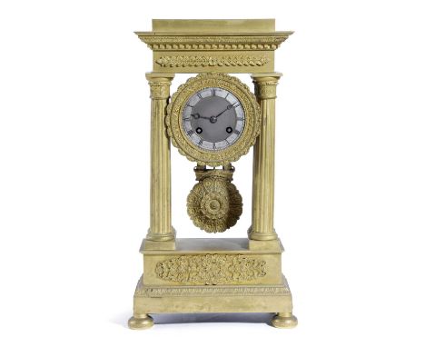 A FRENCH GILT METAL PORTICO CLOCKMID-19TH CENTURYthe brass eight day movement with an outside countwheel and striking half ho