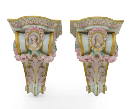 A pair of bisque porcelain wall brackets, Sèvres style, late 19th xentury, of scroll form with female portrait decorated rese