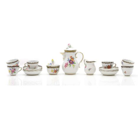 A Meissen part tea service, late 19th century, for six settings, comprising a teapot, 18cm high, a cream jug, 8cm high, a sug