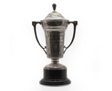 A silver trophy and cover,  by Mappin and Webb, Sheffield, 1935, with twin handles and a cruciform final, engraved 'Civil Ser