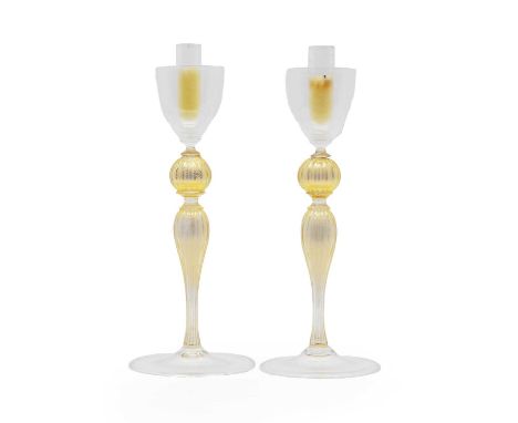 A pair of Murano gilt glass candlesticks,  modern, by Davide Fuin, each with a cup-shaped sconce, inscribed  36cm high (2)   