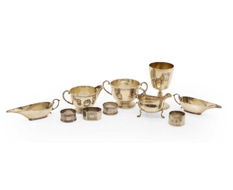 A collection of silver items comprising an armorial chalice goblet, by Barker Ellis Silver Co, Birmingham 1972, with silver g