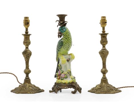 A pair of cast brass table lamps 19th century, each with knopped foliate stems on spreading bases, 36.5cm high to the fitting
