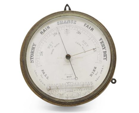 J White, Glasgow, an Aneroid barometer, circular and brass wall mounted, 23cm diameterCondition ReportUsed and with wear.