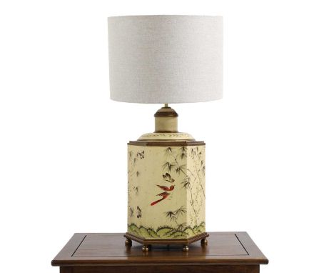 A painted toleware hexagonal table lamp,  decorated with bamboo, birds and butterflies to a cream ground, with plain shade 49
