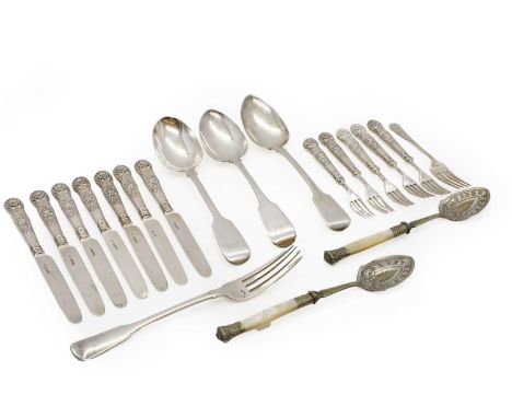 A collection of silver flatware, to include three George III and later tablespoons, a fork, with an engraved stag crest, Lond