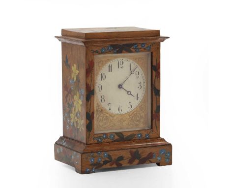 A small rosewood and painted mantel clock, with a silvered dial, the silvered dial with arabic numerals and an engraved face,