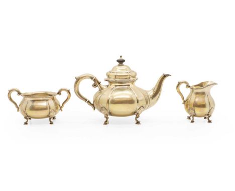 A Danish silver tea service  three towers mark, by J. Holm, assay master Johannes Siggaard, comprising a teapot, with ivory i