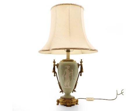 A Sèvres-style porcelain and brass table lamp,  20th century, of urn form, Celadon Pate Sur Pate, with foliate decoration to 