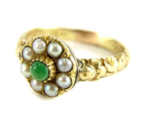 A Victorian memorial type ring, with cluster centre set with seed pearl and jade, with open back, possibly missing a glazed p