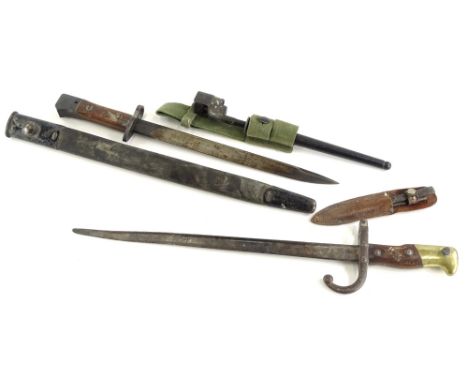 A bayonet stamped GR1 mark MK3, with mahogany handle and associated scabbard, a 19thC French bayonet with mahogany and brass 