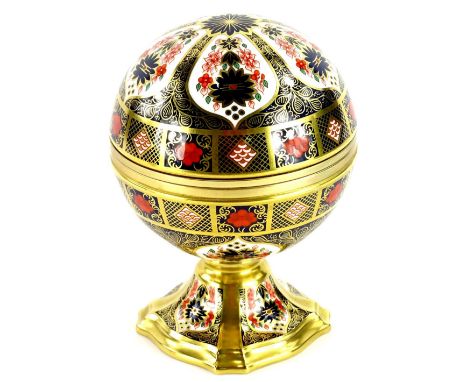 A Royal Crown Derby porcelain Millennium globe clock, with gilt motto to interior There is a Season and a Time etc., the circ