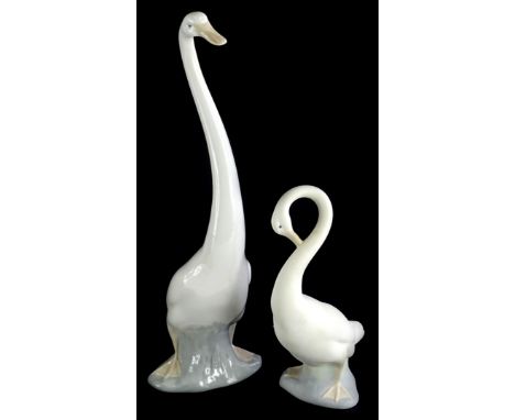 Two Nao porcelain geese, Goose, model no 02000418 issued 1960, 37cm high, and Goose, model number 02000053, issued 1992, 21cm