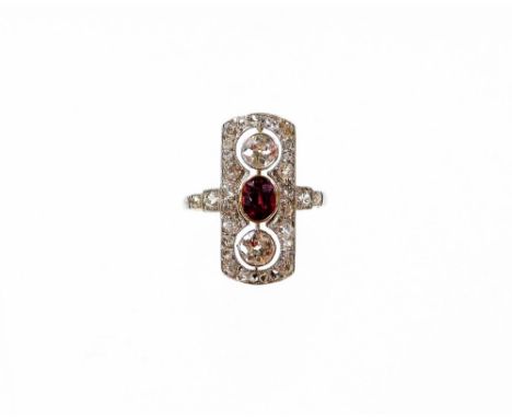 A Victorian ruby and diamond panel ring, the panel set with two old cut diamonds, each 4.2mm x 4.2mm x 2.2mm, approx 0.27cts 