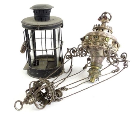 A late 19thC Gothic style hall lantern, with paraffin lamp attachment, inset with coloured glass Cabochon, 67cm high overall,